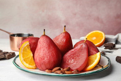 Delicious mulled wine poached pears served on table