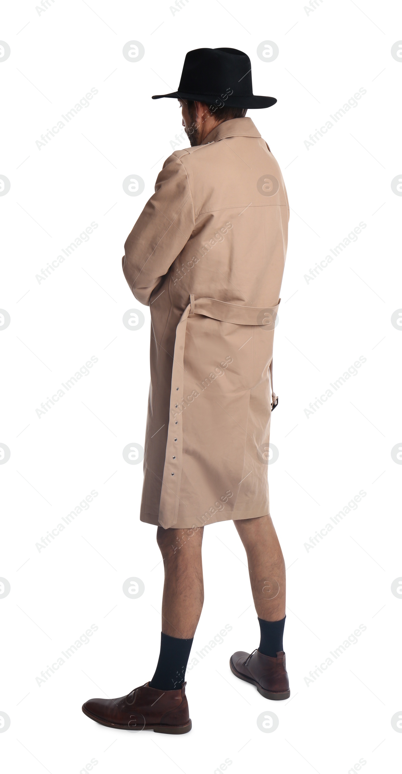 Photo of Exhibitionist in coat and hat isolated on white, back view