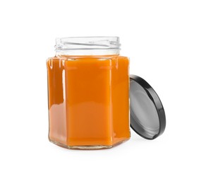 Photo of Delicious persimmon jam in jar isolated on white