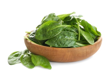 Photo of Fresh green healthy baby spinach leaves in wooden bowl isolated on white