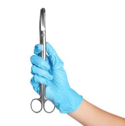 Photo of Doctor in medical glove holding surgical scissors on white background