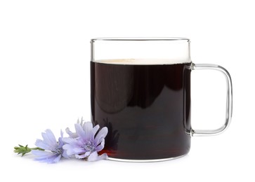 Photo of Glass cup of delicious chicory drink and flowers on white background
