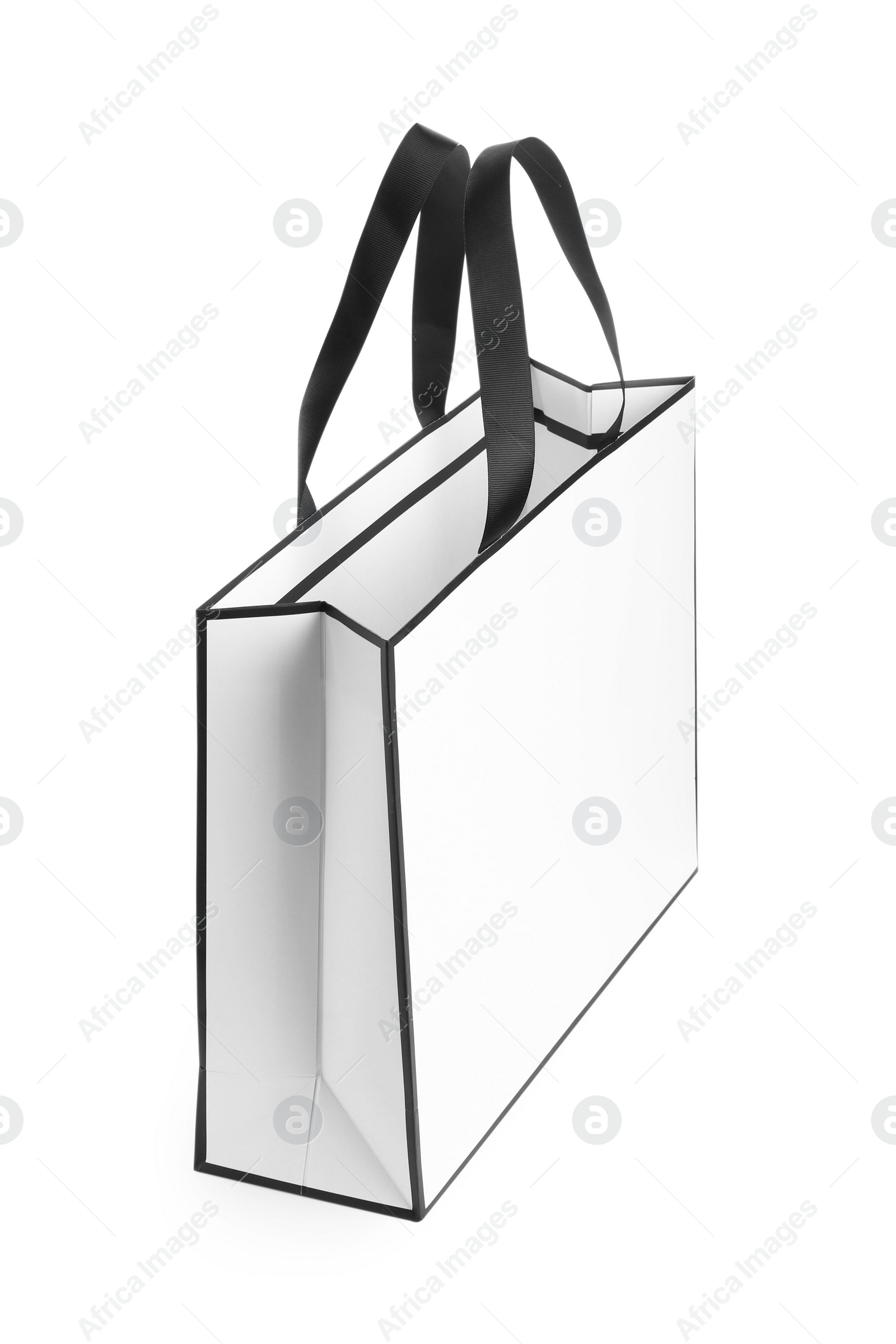 Photo of One paper bag isolated on white. Mockup for design