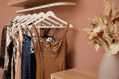 Photo of Collection of trendy women's garments in clothing rental salon
