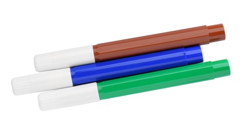 Different colorful markers on white background, top view