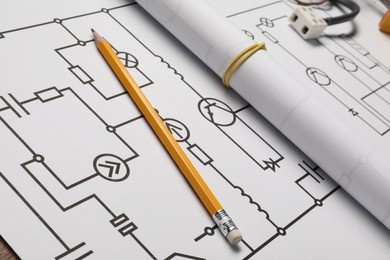 Wiring diagram and pencil on table, closeup