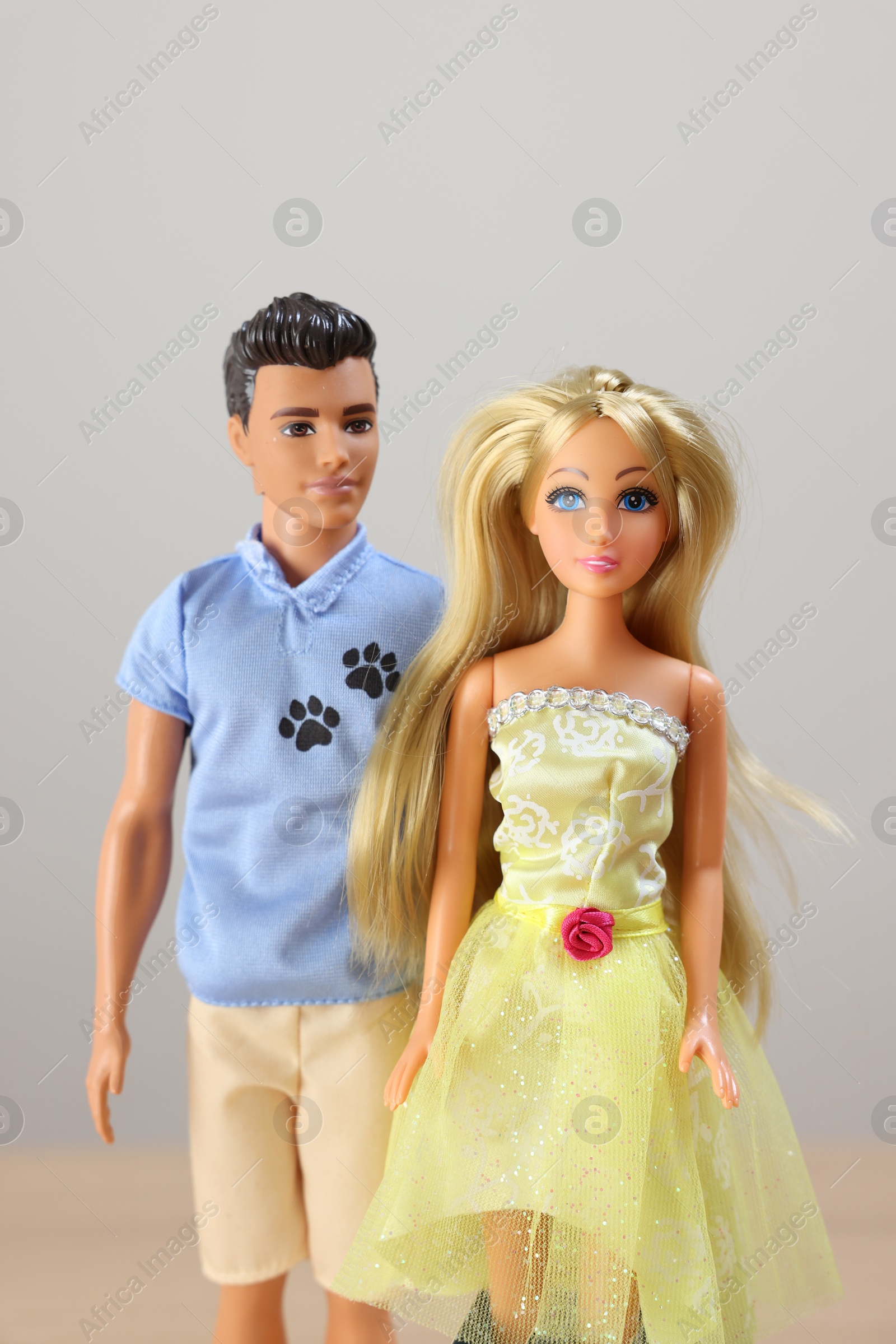 Photo of Leiden, Netherlands - September 20, 2023: Stylish Barbie and Ken dolls on light gray background