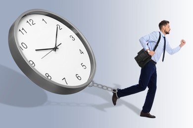 Image of Deadline management. Businessman running away and clock chasing him, because he chained to device. Light grey gradient background