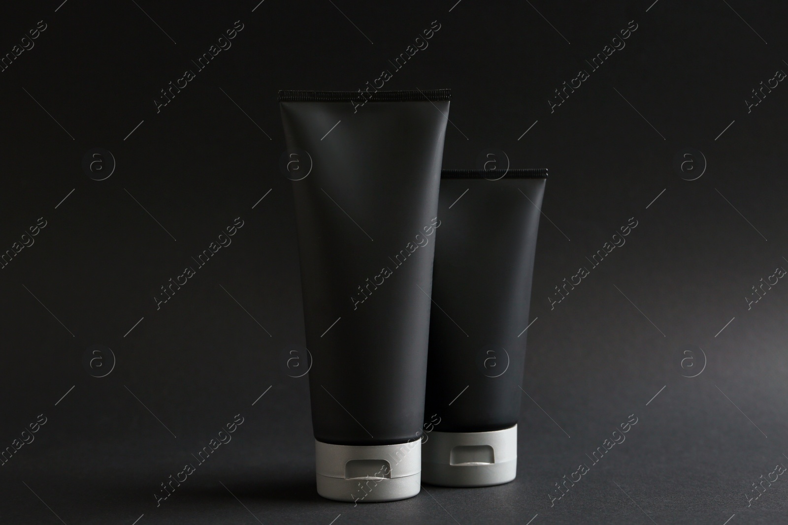 Photo of Set of men's cosmetic on black background. Mockup for design