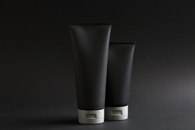 Photo of Set of men's cosmetic on black background. Mockup for design