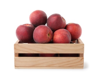 Photo of Crate of delicious ripe peaches isolated on white