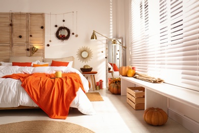 Cozy bedroom interior inspired by autumn colors