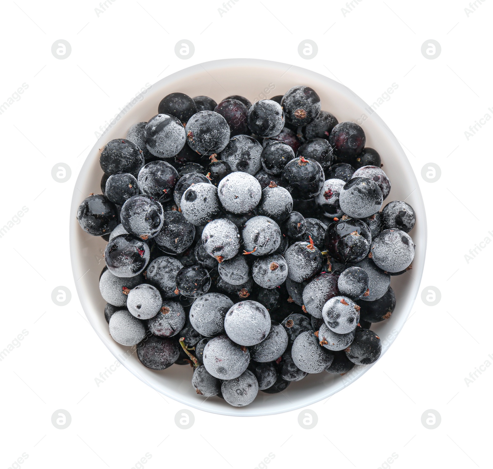 Photo of Tasty frozen black currants in bowl isolated on white, top view