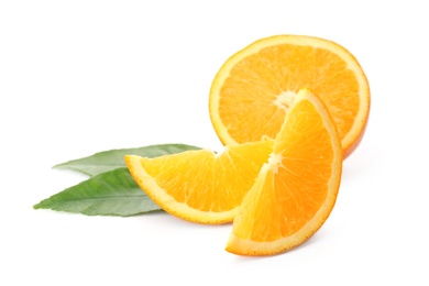 Photo of Cut fresh ripe orange with green leaves on white background