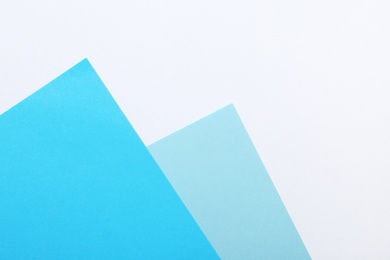 Photo of Colorful paper sheets as background, top view