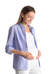 Photo of Happy pregnant woman touching her belly on white background