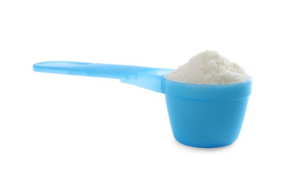 Photo of Scoop of powdered infant formula isolated on white. Baby milk