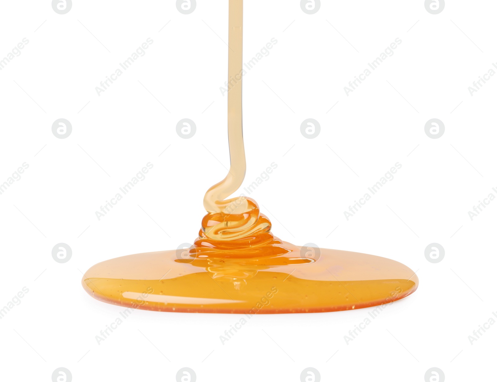 Pouring tasty natural honey isolated on white Photo of Pouring tasty natural honey isolated on white