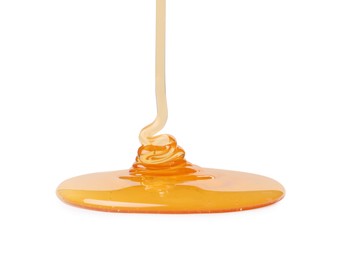 Photo of Pouring tasty natural honey isolated on white