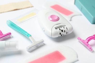 Photo of Set for epilation on white background