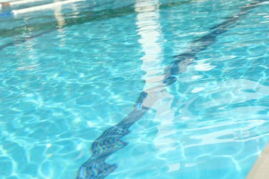 Photo of Outdoor swimming pool with clear rippled water