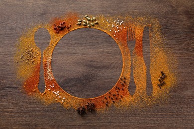 Photo of Silhouettes of cutlery and plate made with spices on wooden table, flat lay. Space for text