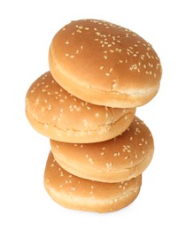 Photo of Many fresh burger buns isolated on white