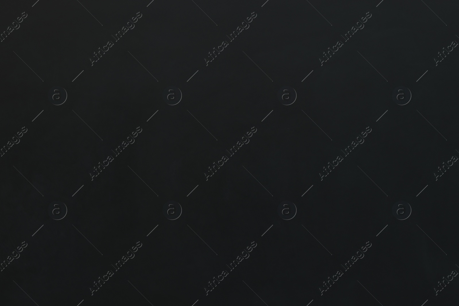 Photo of Blank black chalkboard as background. Space for text