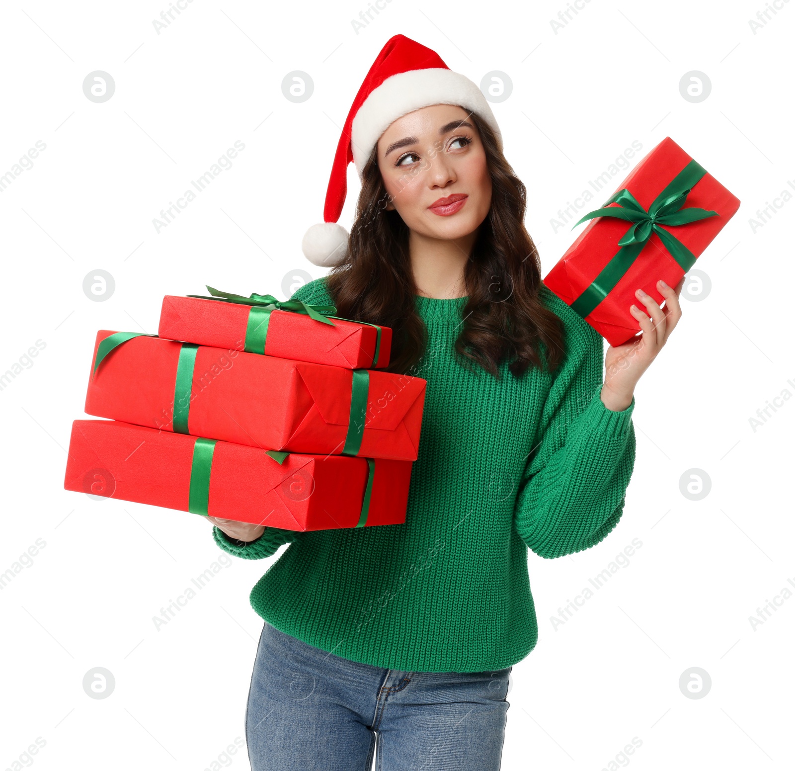 Photo of Beautiful young woman in Santa hat with Christmas gifts isolated on white