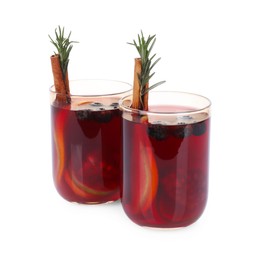 Photo of Aromatic Sangria drink in glasses on white background