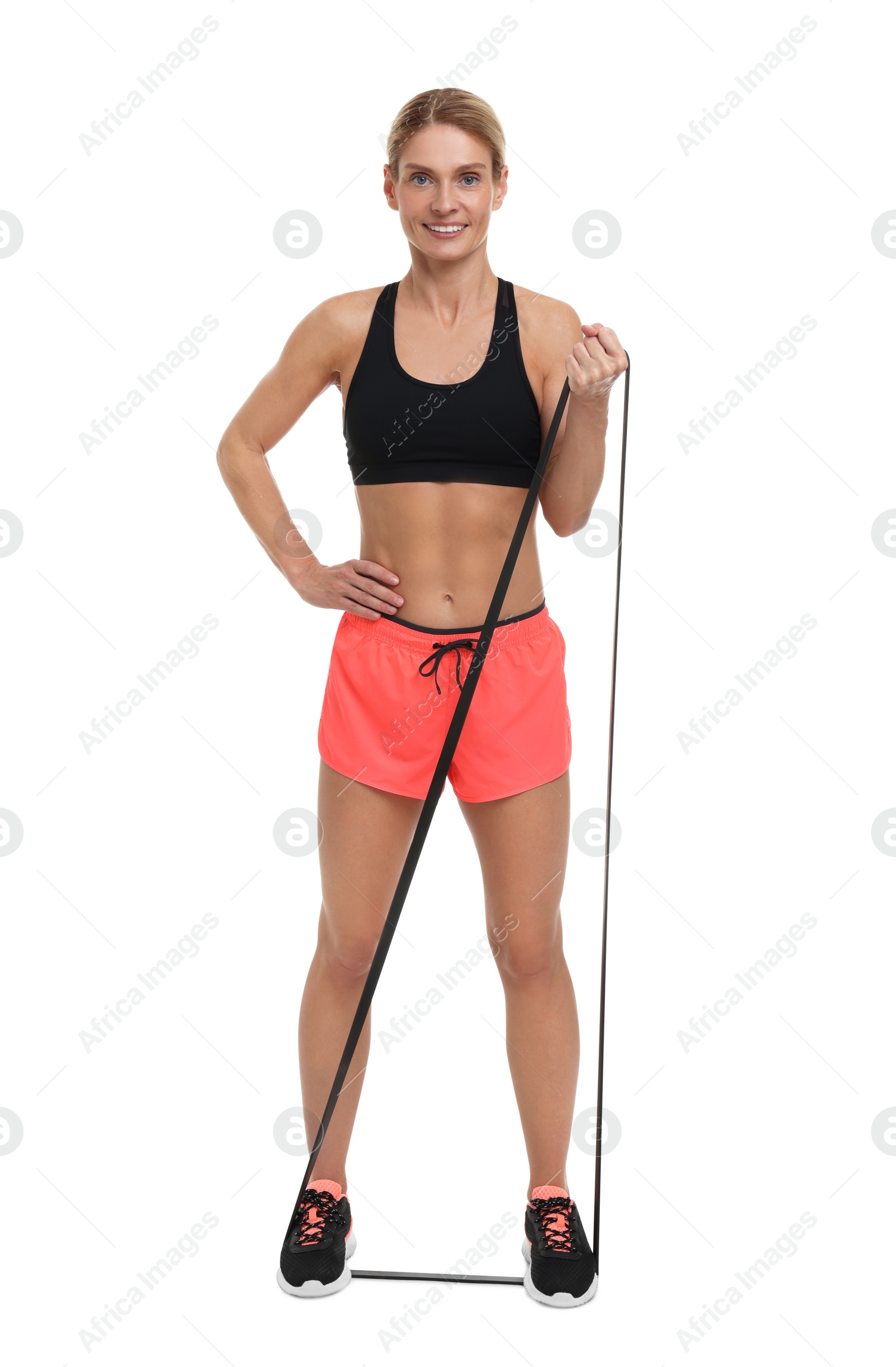 Photo of Woman exercising with elastic resistance band on white background