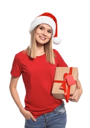 Young woman with Christmas gift on white background