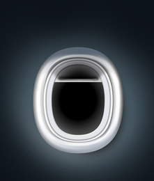 Image of View on dark sky through open airplane porthole at night