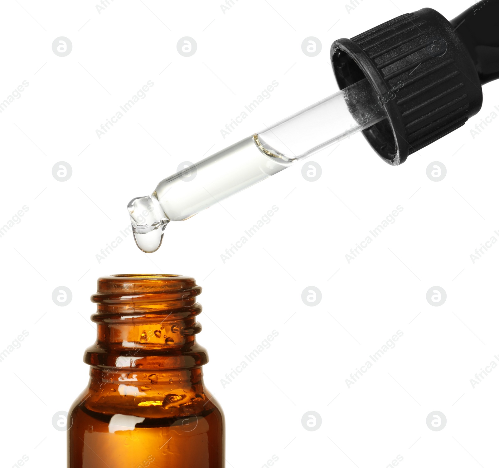 Photo of Bottle and pipette with essential oil on white background, closeup