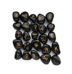 Many black rune stones isolated on white, top view