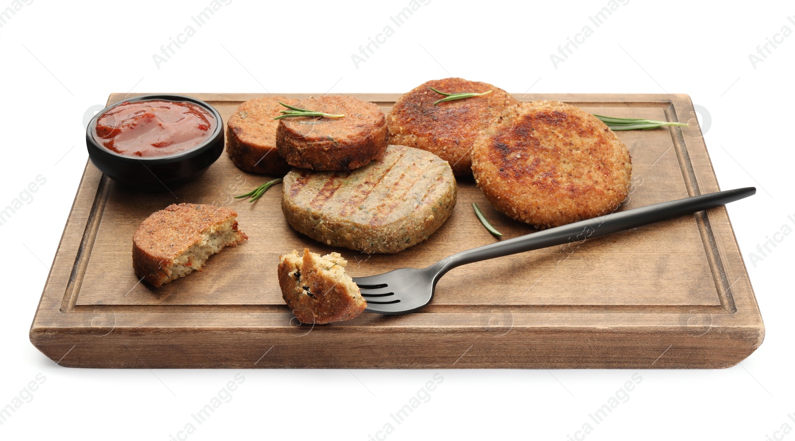 Photo of Fork with piece of delicious cutlet near tasty vegan meat products and sauce on white background