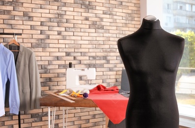 New black mannequin in tailor studio