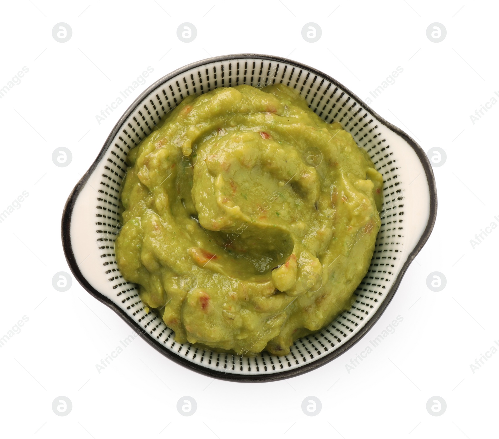 Photo of Bowl of delicious guacamole isolated on white, top view