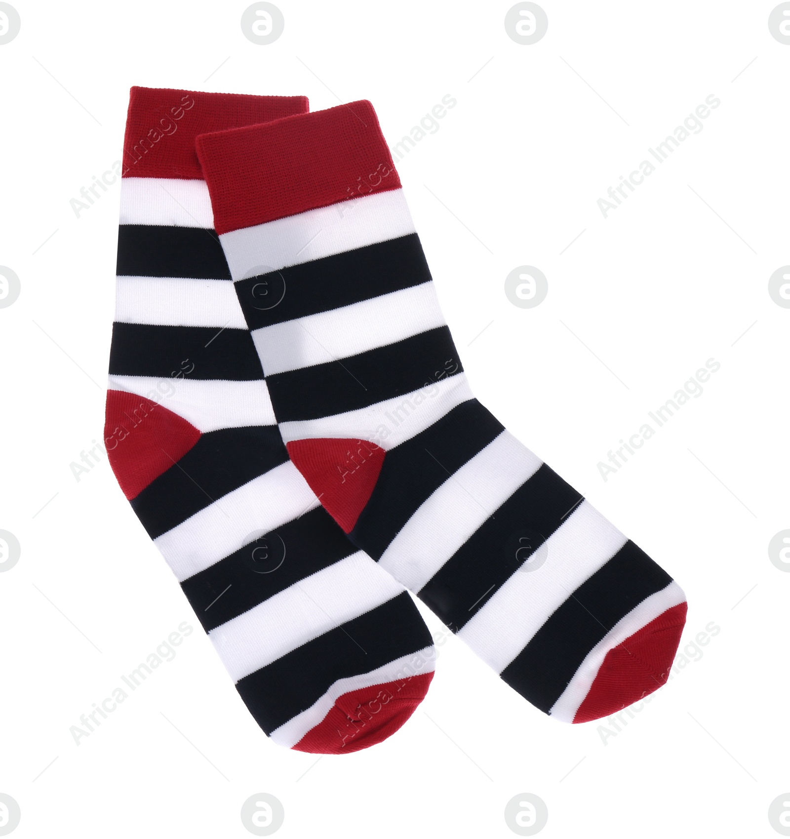 Photo of Striped socks on white background, top view