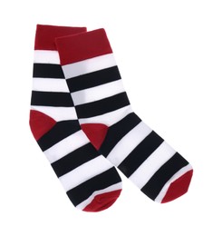 Photo of Striped socks on white background, top view