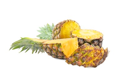 Image of Cut fresh juicy pineapples isolated on white