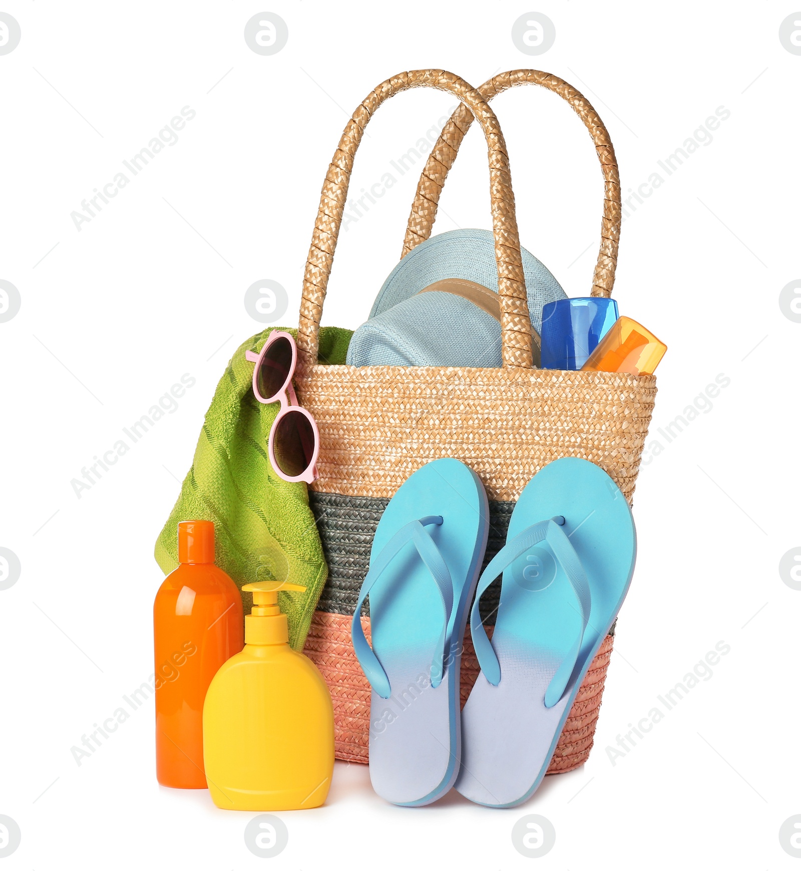 Photo of Set of different beach accessories isolated on white