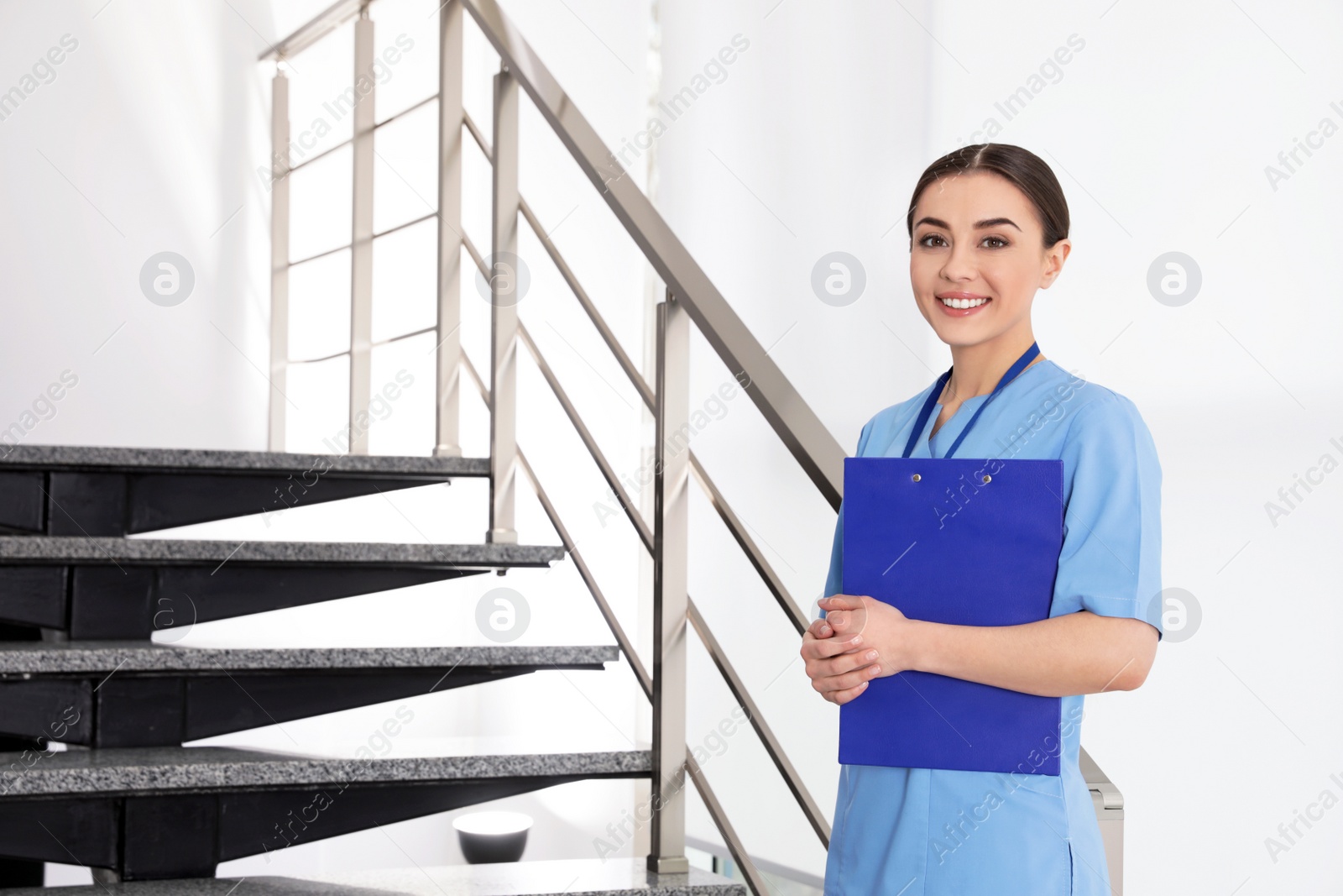 Photo of Portrait of young nurse in hospital. Medical assistant