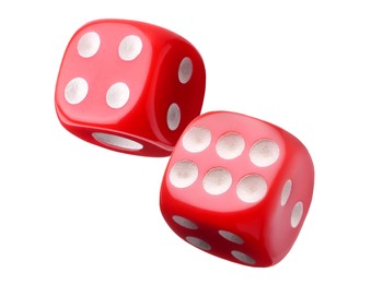 Two red dice in air on white background