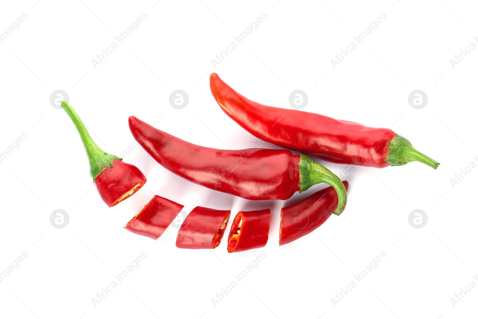 Photo of Fresh red chili peppers on white background, top view