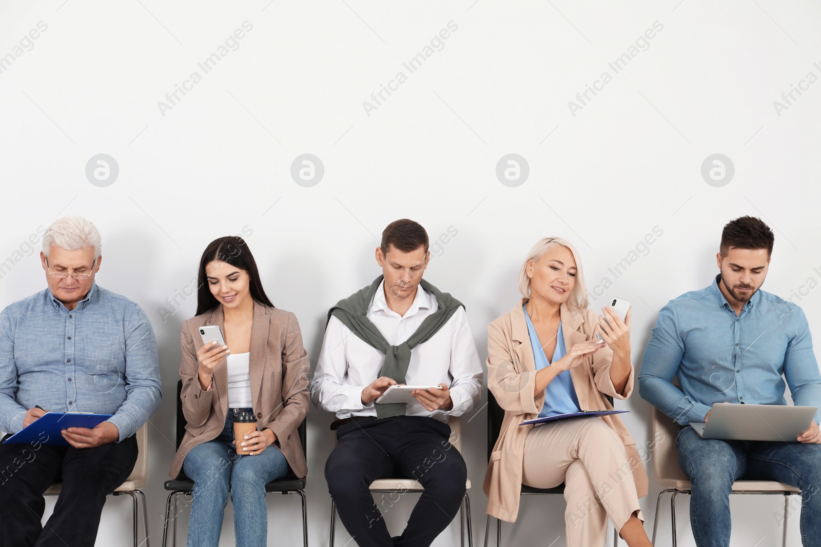 Photo of People waiting for job interview in office