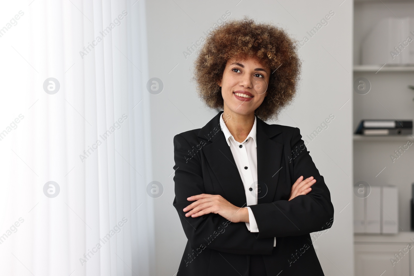 Photo of Happy notary in office, space for text