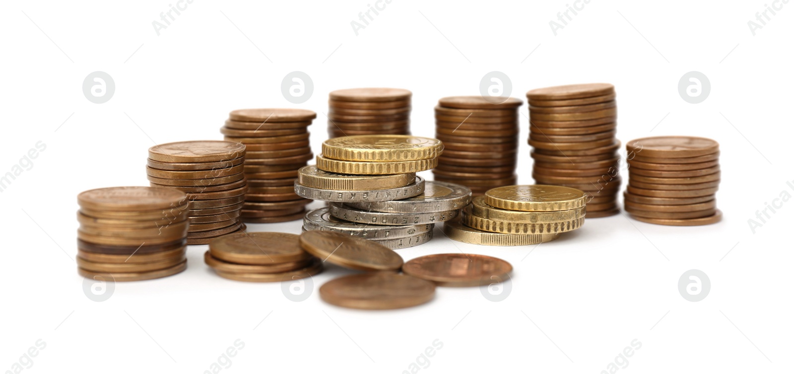 Photo of Stacks of metal coins on white background