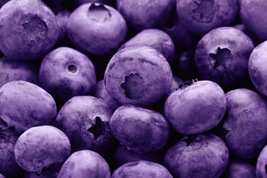 Image of Tasty fresh ripe blueberries as background, closeup