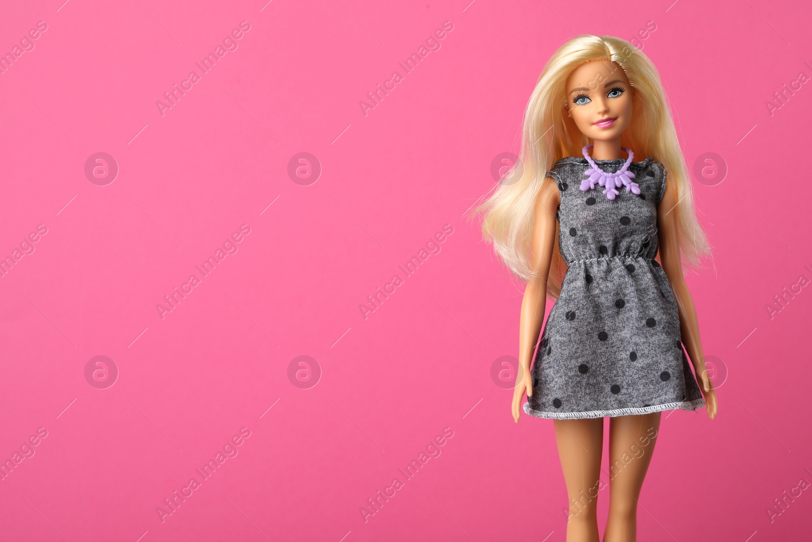 Photo of Mykolaiv, Ukraine - September 4, 2023: Beautiful Barbie doll on pink background, space for text